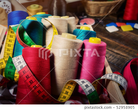 Coil threads for overlock and measuring band in sewing supplies 52958905