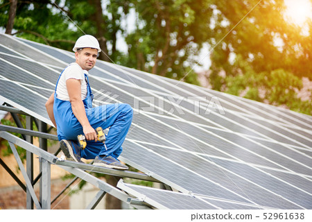 Installing of solar photo voltaic panel system Installing of solar photo voltaic panel system 52961638