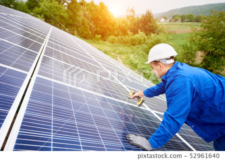 Installing of solar photo voltaic panel system Installing of solar photo voltaic panel system 52961640