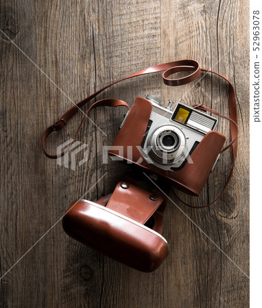 vintage camera on wood background vintage camera on wood background 52963078