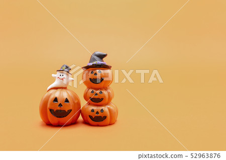 Halloween pumpkins yellow background. Halloween pumpkins yellow background. 52963876