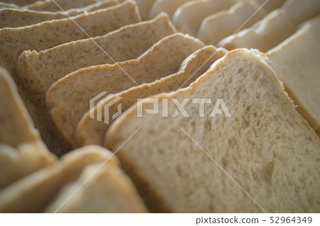 Line up of bread in the basket Line up of bread in the basket 52964349