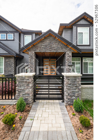 Entrance of luxury residential house with stone textured walls 52967386
