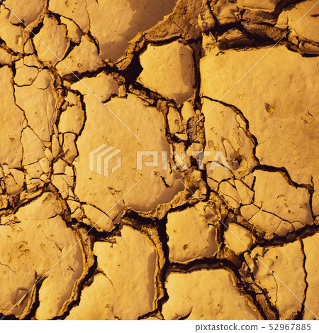 Dried mud background and climate change symbol Dried mud background and climate change symbol 52967885