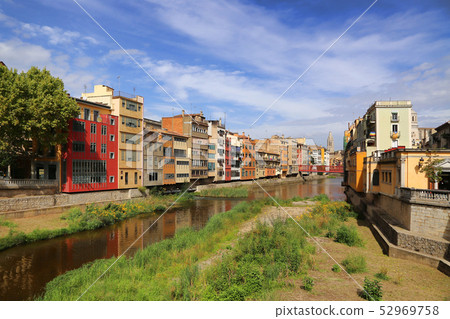 Colorful houses and Eiffel bridge and river Onyar Colorful houses and Eiffel bridge and river Onyar 52969758