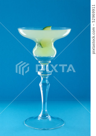 Hemingway daiquiri cocktail on blue background Hemingway daiquiri cocktail on blue background 52969911