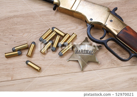 Wild west gun with ammunition and marshal badge 52970021