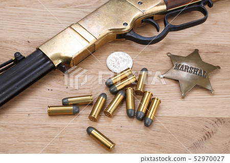 Wild west gun with ammunition and marshal badge 52970027