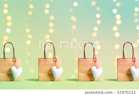Shopping bags on a shiny background Shopping bags on a shiny background 52970152