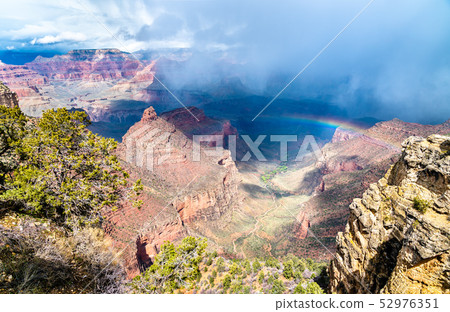 Rainbow above the Grand Canyon in Arizona, USA Rainbow above the Grand Canyon in Arizona, USA 52976351