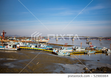 Tidal-flat fishing boats and bridges Tidal-flat fishing boats and bridges 52980864