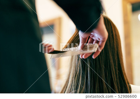 Hair salon brush brushing 52986600