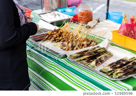 Street stall bazaar selling satay and otak-otak 52989596