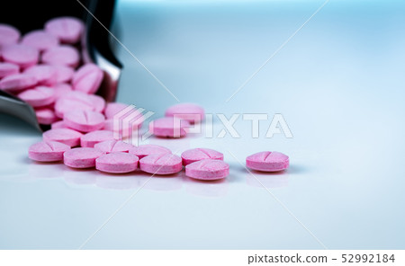 Pink tablets pills. Pharmaceutical industry. Pink tablets pills. Pharmaceutical industry. 52992184