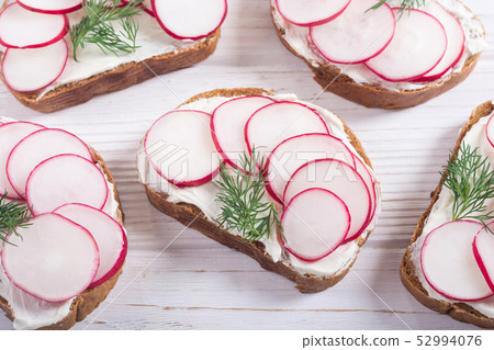 Healthy vegetable toasts sandwith with radish and Healthy vegetable toasts sandwith with radish and 52994076