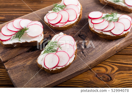 Healthy vegetable toasts sandwith with radish and Healthy vegetable toasts sandwith with radish and 52994078