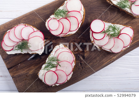 Healthy vegetable toasts sandwith with radish and Healthy vegetable toasts sandwith with radish and 52994079