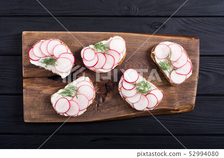 Healthy vegetable toasts sandwith with radish and Healthy vegetable toasts sandwith with radish and 52994080