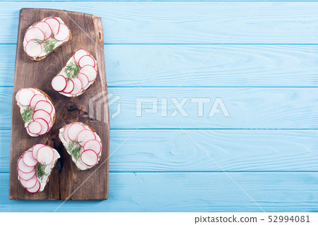 Healthy vegetable toasts sandwith with radish and Healthy vegetable toasts sandwith with radish and 52994081