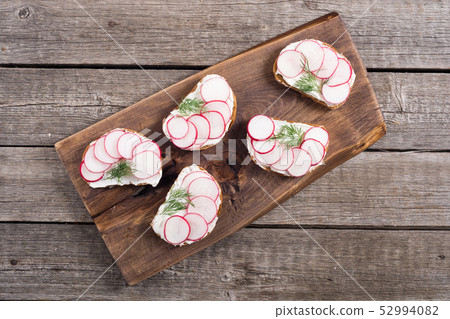 Healthy vegetable toasts sandwith with radish and Healthy vegetable toasts sandwith with radish and 52994082