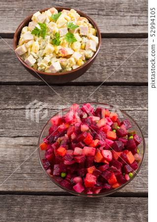 Traditional Russian salad olivier andvinaigrette Traditional Russian salad olivier andvinaigrette 52994105