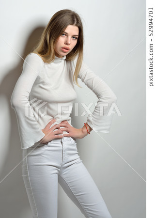 sexy beautiful woman in white clothes posing in sexy beautiful woman in white clothes posing in 52994701