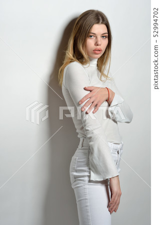 sexy beautiful woman in white clothes posing in sexy beautiful woman in white clothes posing in 52994702