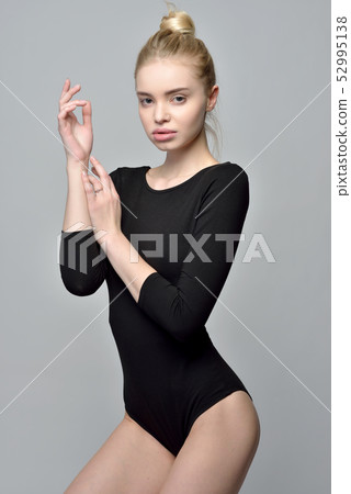 portrait of the beautiful blonde gymnast woman i portrait of the beautiful blonde gymnast woman i 52995138