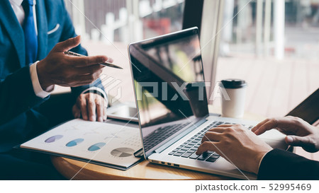 Business people team discuss and analyzing on 52995469