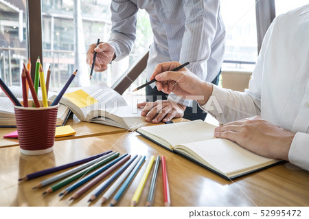 Tutor, learning, education, Group of teenager Tutor, learning, education, Group of teenager 52995472