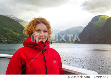 Young woman travels in Norway Young woman travels in Norway 52995857