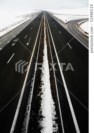 Four-lane highway in winter at Bulgaria 52996519