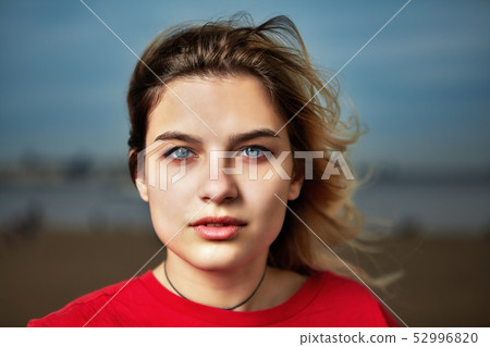 Outdoor portrait of european girl. 52996820