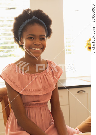 Happy African American girl looking at camera 53000809