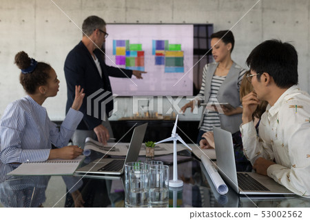Business people having discussion in a meeting Business people having discussion in a meeting 53002562