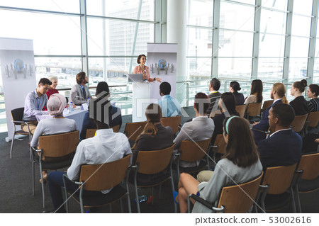 Group of business people attending a seminar 53002616