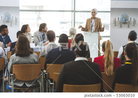 Female speaker speaks in a business seminar Female speaker speaks in a business seminar 53003010