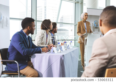 Female speaker speaks in a business seminar Female speaker speaks in a business seminar 53003311