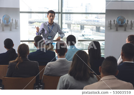 Young male professionals speaks at a business seminar Young male professionals speaks at a business seminar 53003559