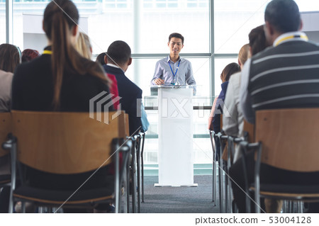 Businessman speaks in a business seminar Businessman speaks in a business seminar 53004128