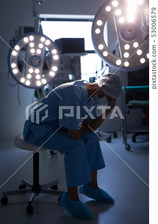 Female surgeon sitting in operation room at hospital 53006579