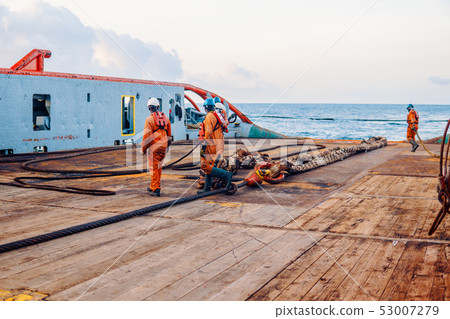 Vessel crew preparing vessel for static tow tanker lifting Vessel crew preparing vessel for static tow tanker lifting 53007279