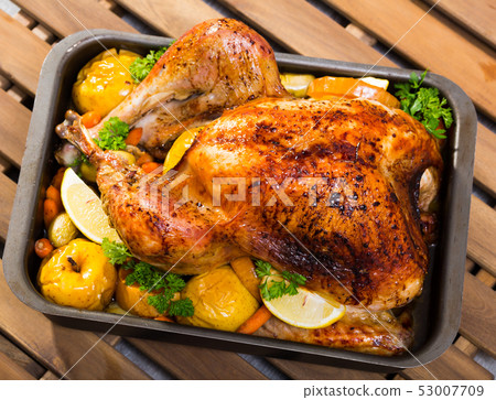 Roasted turkey with apples Roasted turkey with apples 53007709