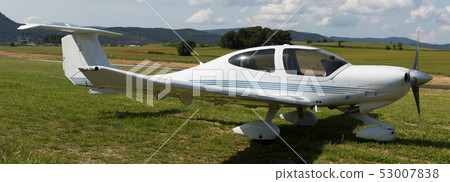 Sport airplane standing on airfield Sport airplane standing on airfield 53007838