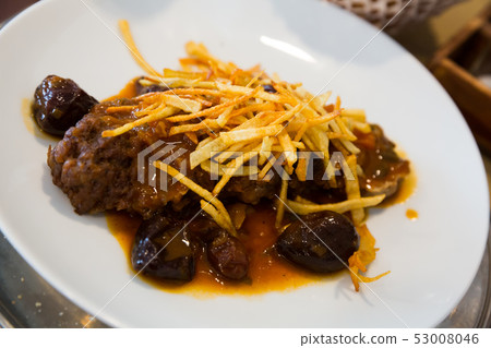 Catalan stew with raisins and plums 53008046