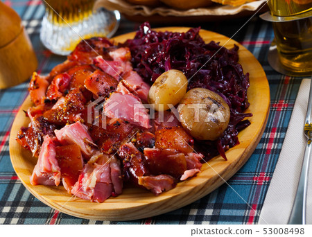 Sliced pork shank with braised cabbage 53008498