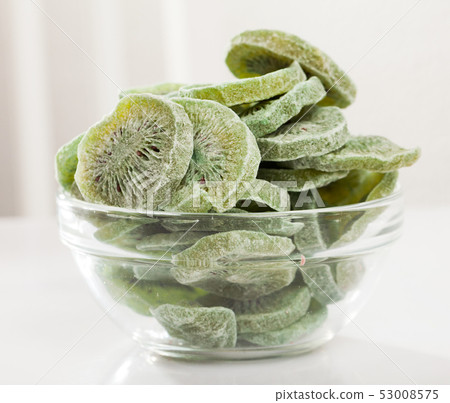 Dehydrated kiwi slices in bowl Dehydrated kiwi slices in bowl 53008575