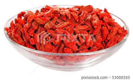 Glass bowl with dried goji berries Glass bowl with dried goji berries 53008583