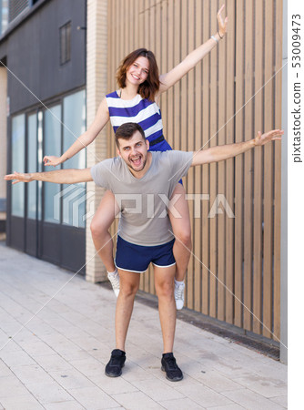Young loving couple have a good time Young loving couple have a good time 53009473