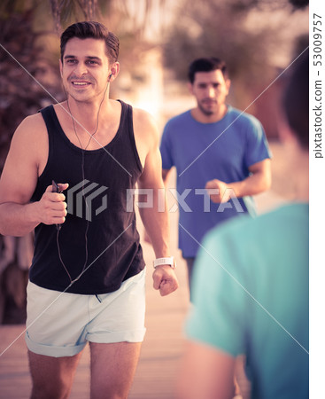 Two friends are doing race in time training 53009757